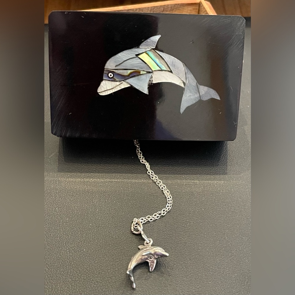 Stamped 925  30”silver chain with stamped dolphin pendant. With wood inlay box